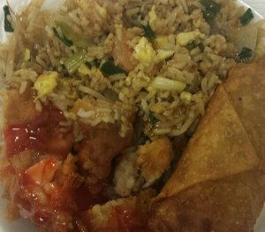 Yummy Shrimp Fried Rice, Sweet and Sour Chicken (your choice of dark or white meat), and an egg roll the size of a borrito